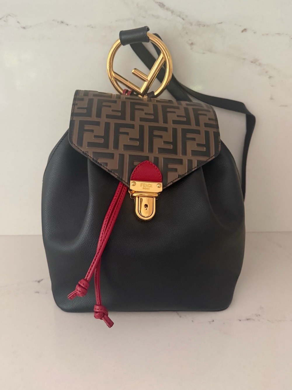Fendi Drawstring Flap Leather with Zucca Embossed Detail Small backpack